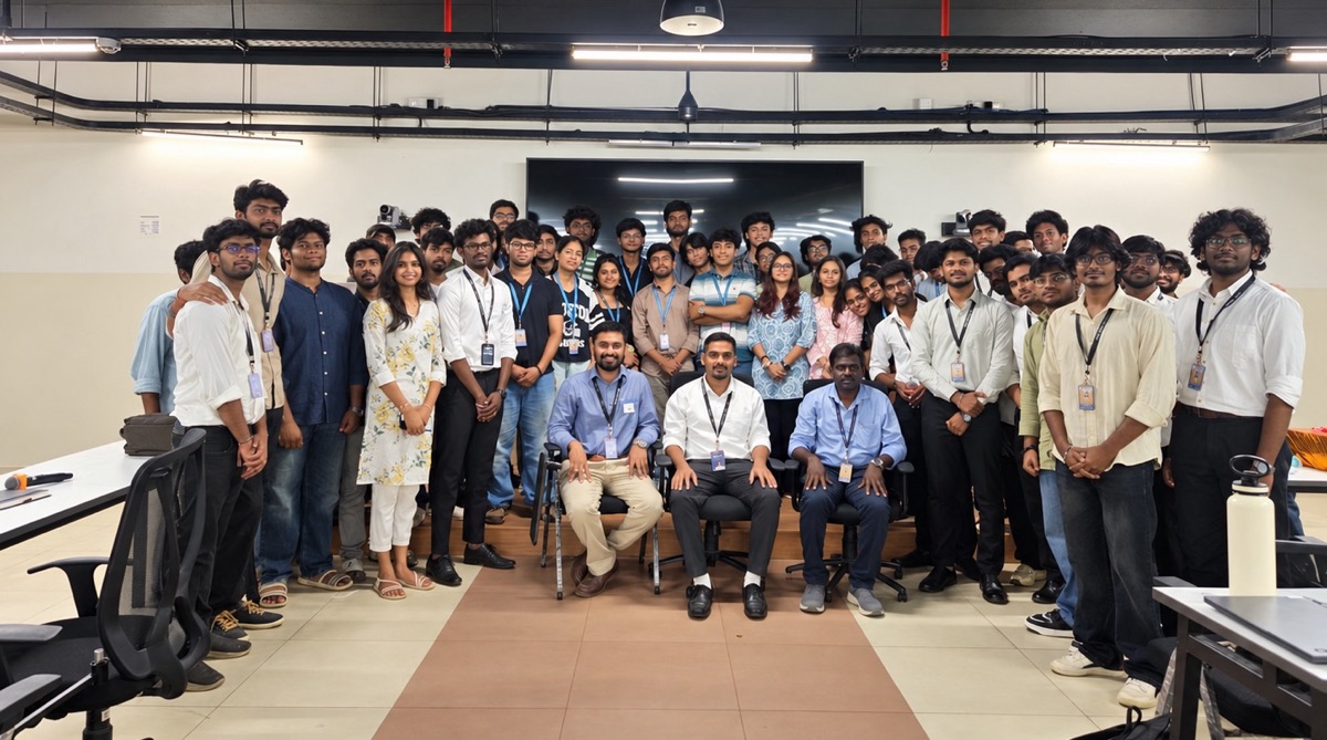 Participants and organisers of the DOOMSDAY 2026 hackathon gathered for a group photo in the hall at SRMIST